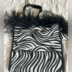 10 for $10 choose 10 items marked 10 for $10 
Zebra bag change purse feathers